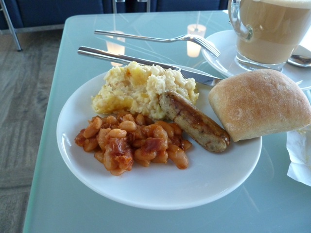 My breakfast: beans, scrambled egg and a veal sausage.
